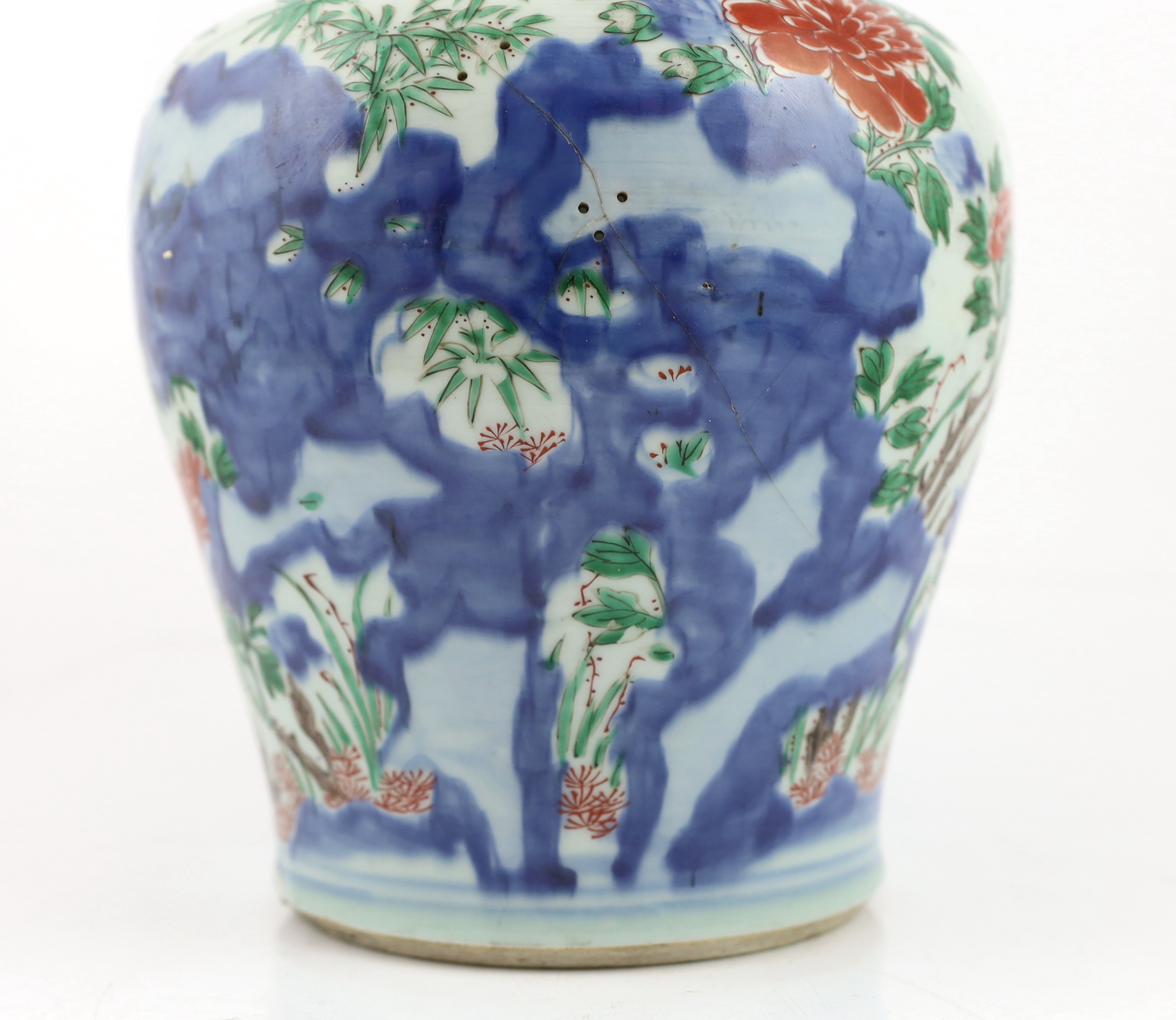 A Chinese wucai ‘rocks and blossom’ vase, Transitional, Shunzhi period, cracked and restoration to neck